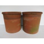 Pair of matching terracotta chimney pots. Each approx 12 inches tall. See photos.