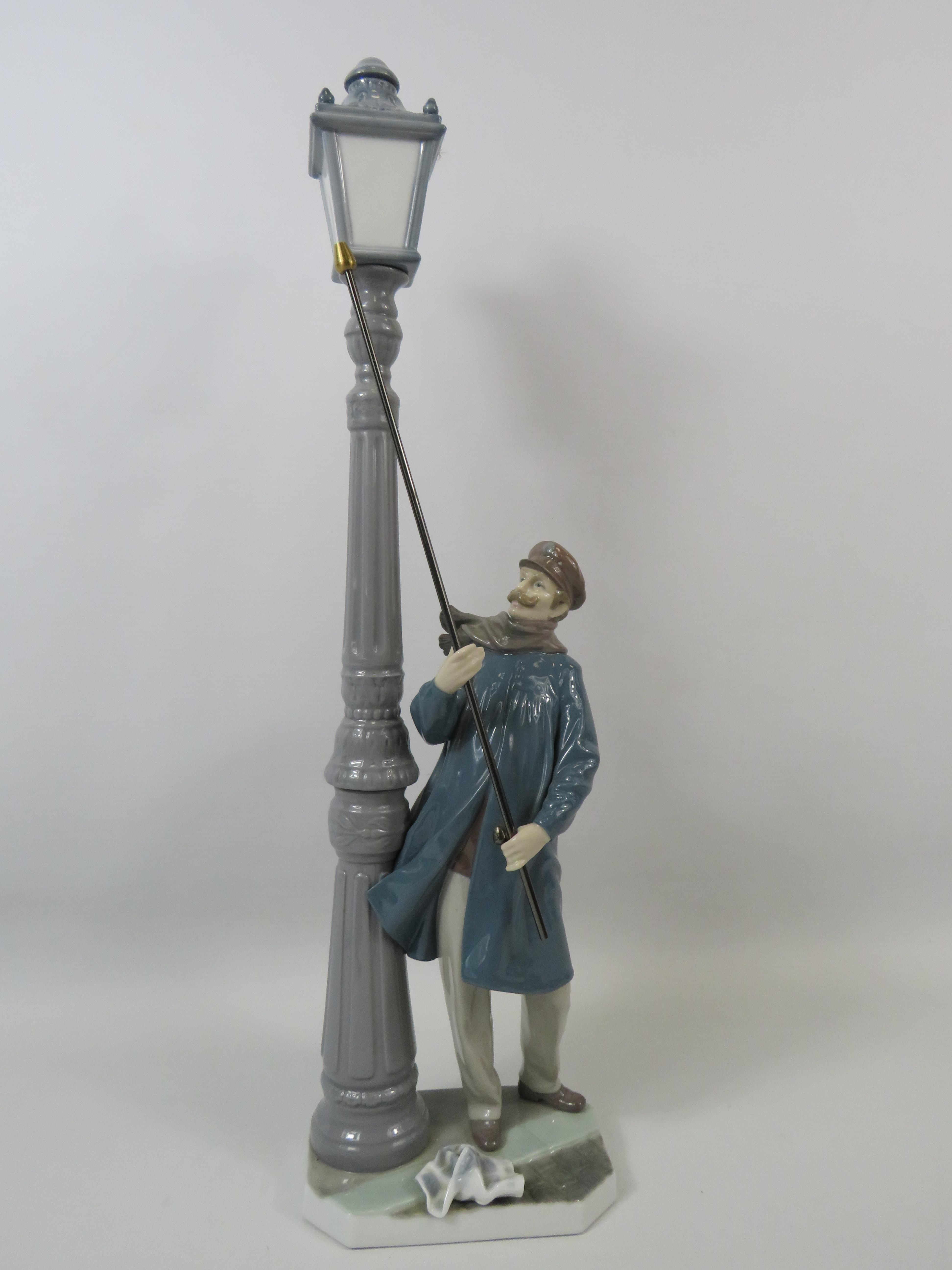 Lladro Figurine Lamp lighter, approx 19" tall and come with its box.