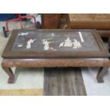 Beautifully carved Opium style table believed to have been brought from Thailand. Raised on carved