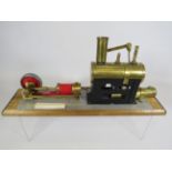 1941 Cyldon Steam engine on wooden plinth with three wick burner. Excellent condition. See photos.