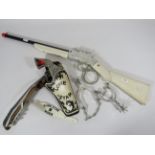 Lone Star Cowboy gun, Holster, Spurs and Rifle. (one side of gun handle missing.) See photos.