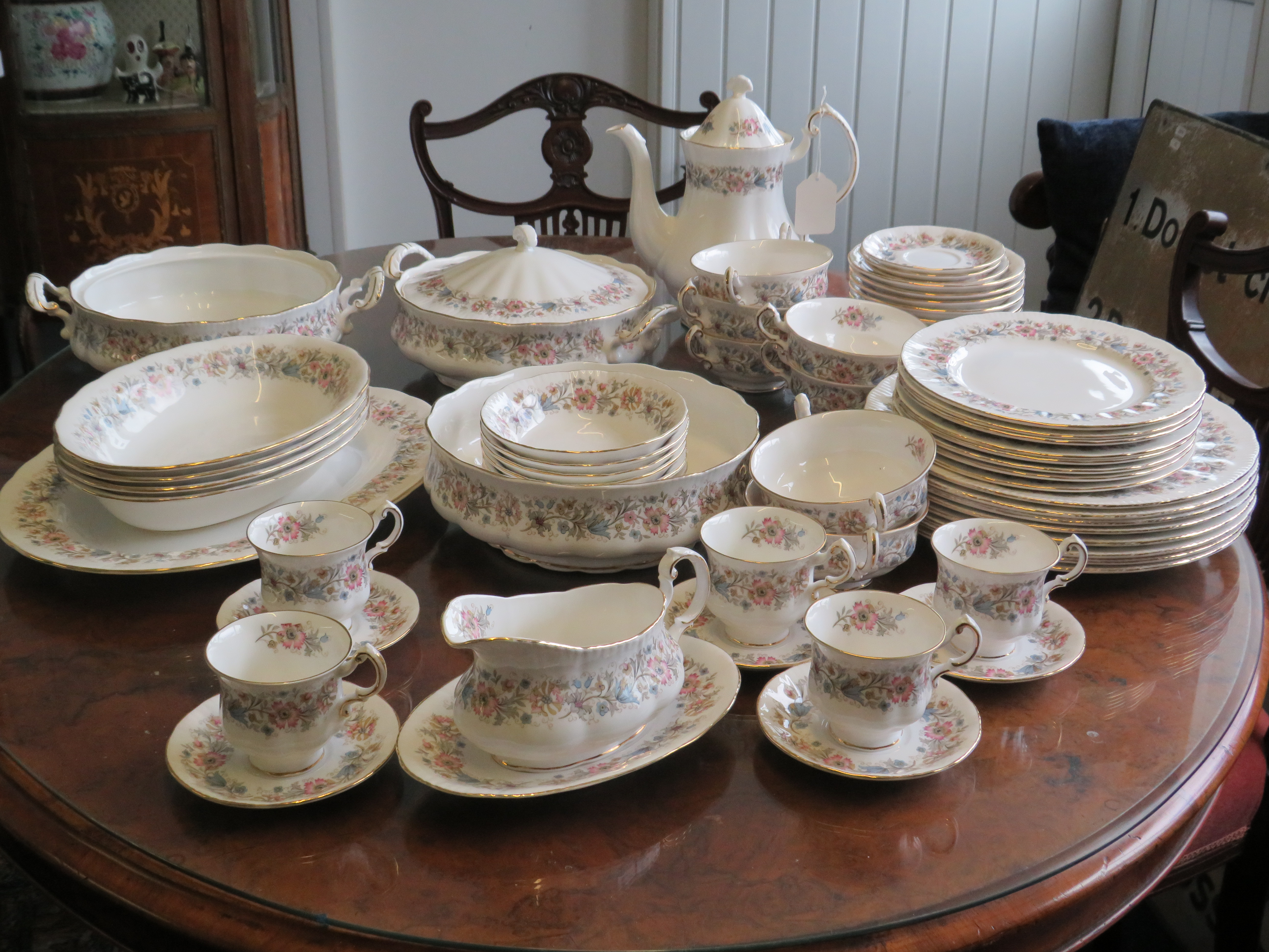 Over 65 pieces of Paragon china dinner / teaset in the Meadowvale pattern.