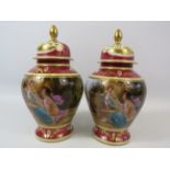 Pair of Vienna style lidded urn vases, both have had a repair/ damage to the lids. Approx 9" tall.