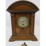 Vintage Junghams wooden mantle clock 10 3/4" tall and 8 3/4" wide. Needs attention to run.