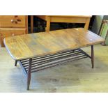 Mid 20th Century Dark wood Ercol Style low coffee table with mag rack under. H:14 x W:41 x D:18 Inch