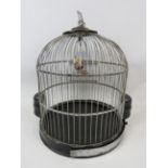 Vintage birdcage by Genykage. Original ceramic feeders with screw out bottom for cleaning. Hanging c