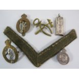 Military Cap badges, Sterling silver army reserves badge and a silver Ingot.