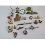 Selection of various RAF badges plus a sterling silver Navy badge etc.