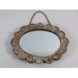 Interesting hand or hanging mirror with chain. Made from Continental (0.900) silver with heavy repou