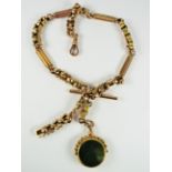 Antique 9ct Gold Watch chain with spinning Green and Red Cornelian Stone fob which is hallmarked for