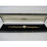 Ladies Accurist watch in 9ct Gold with a 9ct Gold Strap. Original box. Will need battery to run. Tot