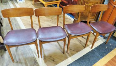 Quartet of Mid 20th CenturyTeak chairs with leatherette seat squabs. See photos . S2