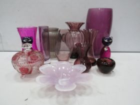 Large selection of purple art glass vases and bowls etc.