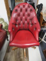 Lovely Red leather Chesterfield style button backed office or study chair. Height adjustable and set