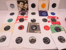 Approx 50 Vinyl 45's mostly from the 1960's era. See photos.