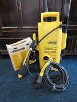 Karcher Pressure washer model K2.36 with accessories. Believed to be in working order. See photos.