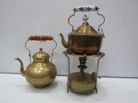 Brass spirit kettle and burner plus one other brass kettle.