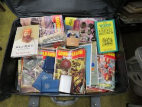 Suitcase of vintage look and learn magazines, coinsets, cricket related items etc