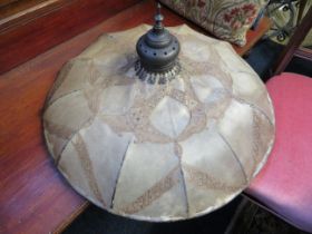Early 20th Century parasol type ceiling lamp shade with metal spoke struts shaping a parchement styl