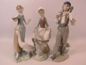 3 Lladro figurines the tallest measures 9.5". Girl with goose, Girl with rabbit and a man with a bag