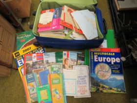 Suitcase full of various maps.