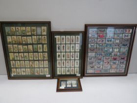 Three large framed collection of cigarette cards (one contains facsimiles) see photos.