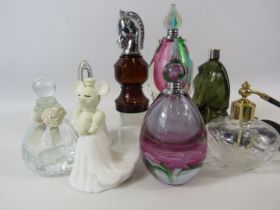 Selection of various vintage and art glass perfume bottles.