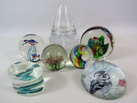 7 Various art glass paperweights.