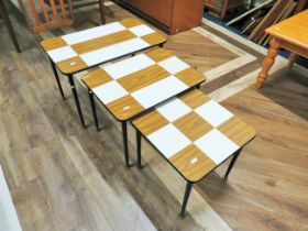 Nest of three graduated stacking table with Cool Grain & White designs to tops. Largest measures H:1