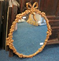 Pretty Gilt framed oval mirror which measures 22 x 18 Inches. See photos. S2