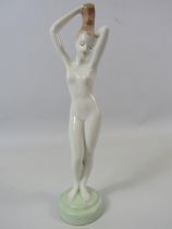 Art Deco figurine of a naked lady by A Quincum Budapest , approx 9" tall.