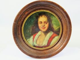 Beautifully painted oil on board of a young Girl in Victorian era costume. Housed in a circular oak 