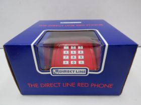 Direct line red telephone unused in the box.