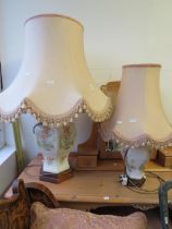  Two very pretty Poppy patterned table lamps with shades. Largest measures 34 inches. See photos.   