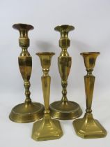 2 Pairs of vintage brass candlesticks the tallests measure 10 1/4".