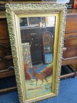 Victorian era painted glass mirror in ornate gilt frame which features a woodland stag.  43 x 20 Inc