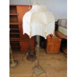 Large brass standard lamp in the shape of a cornithian column   52 inches tall. Working order.  See 