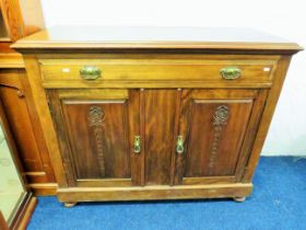 Handsome Dresser with single long drawer to top and twin cupboard doors below. Raised on turned bun
