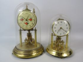 2 Glass domed carriage clocks by Kundo and Bentima, the tallest measures 9.5" tall. Working