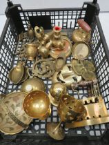 Tray of small brass ornaments.