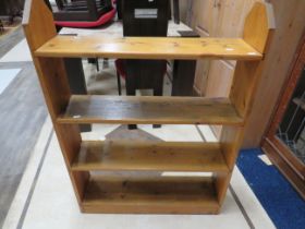 Nicely made free standing pine bookcase with three fixed shelves. H:42 x W:31 x D:8 inches. See pho