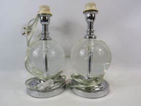 2 Very Heavy crystal glass table lamps with chrome bases, approx 15" tall.