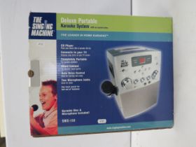 Deluxe Portable CD Karaoke system boxed.