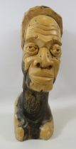 Large Ethnic carved bust, 15.5" tall in a marbled wood with the Initals BP carved in the back.