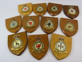 11 RAF wooden wall plaques.