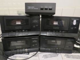 Four Realistic Stereo Cassette players with Instructions plus a Realistic Stereo Audio Selector. Wo
