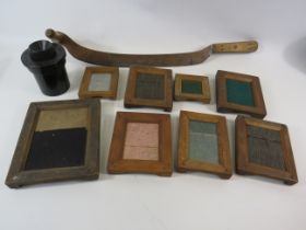 Selection of antique wooden presses, Guillotine blade and a bakelite photography tin.