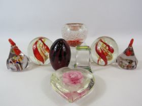 8 Various art glass paperweights.