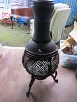 Metal Garden Chimnea in useable condition . Measures 34 inches. Tall. See photos. RR