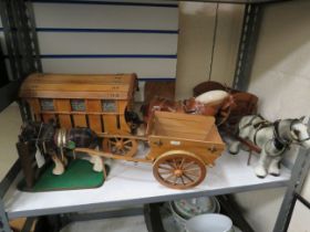 3 Large ceramic horses plus 2 carts and a bow top caravan.